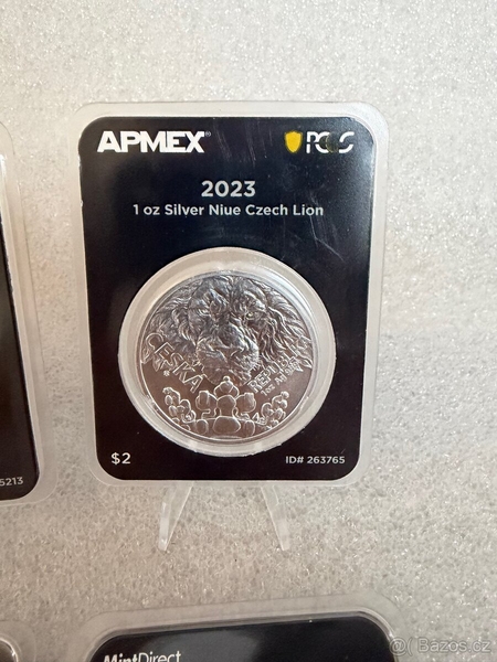 2x stříbrná mince 1 oz Český lev 2022+ 2023 BU Apmex (MD® Premier + PCGS FS)